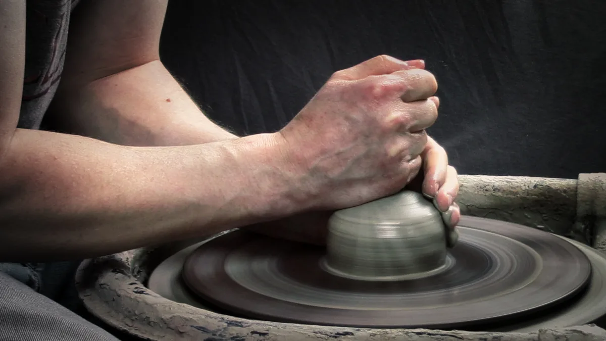 hand position for centering clay